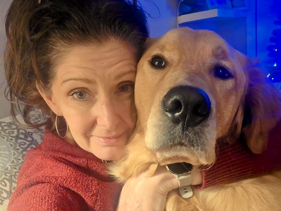 Kay with one of her golden retrievers
